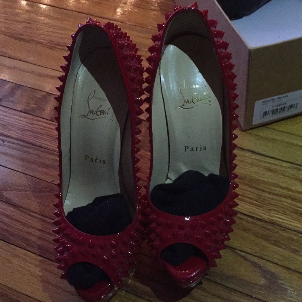 Spiked red Christian louboutins